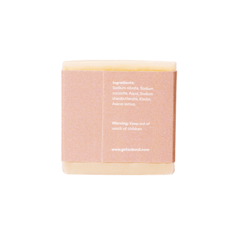 Unscented oatmeal soap bar for dogs with sensitive skin, featuring gentle ingredients and sustainable packaging from Onbord.
